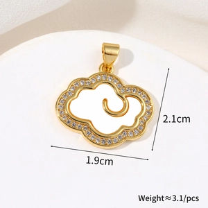 Detailed view of gold cloud pendant with dimensions 2.1cm by 1.9cm and zircon inlay