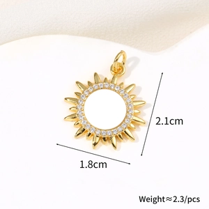 Detail of 18k gold plated sun pendant necklace with zircons and shell center, 1.8x2.1cm