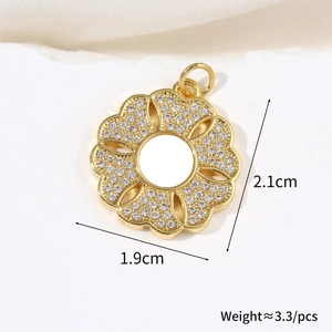 Detailed size view of golden floral pendant with white shell petals and zircons