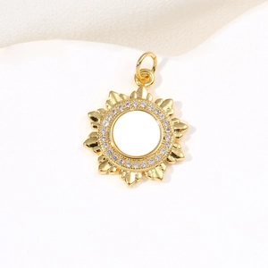 18k gold sunflower pendant necklace with zircons and shell details on a white background