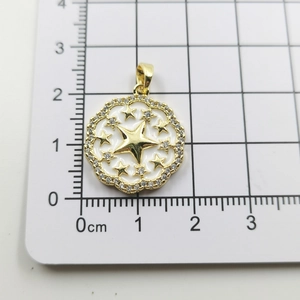 Detailed size measurement of a gold star pendant with white enamel and tiny zircons