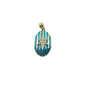 Blue and gold enamel oval pendant with a sparkling hexagonal star on white background