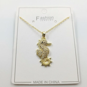 Golden seahorse pendant necklace with sparkling rhinestones on fine cross chain link