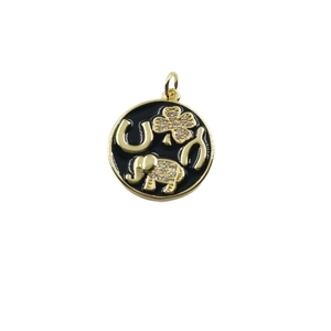 Gold-plated elephant necklace pendant with horseshoe and clover symbols on black enamel