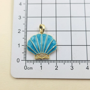 Detailed measurement of a sea blue shell pendant with gold veins and white zircons