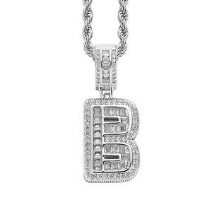 Macro detail of silver-toned letter B pendant with micro-paved sparkling cubic zirconia