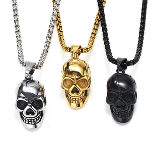 Three-color skull pendants in gold, silver and black stainless steel on punk box chains