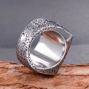 Punk style wide stainless steel ring for men with vintage hammered lava texture