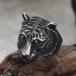 Macro shot of detailed tiger head ring with antique finish and punk aesthetic texture