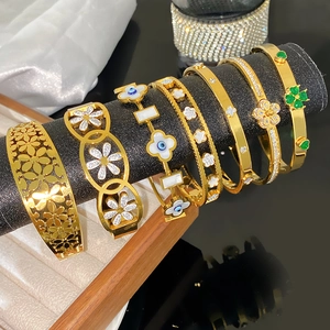 Bracelet Jonc de Luxe en Acier Titane Motif Fleur Creuse pour Femmes Plaqué Or Marguerite Trèfle à Quatre Feuilles Strass Bijoux