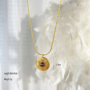 Vintage gold necklace with 1.5cm sunburst tiger eye pendant and 45cm adjustable chain