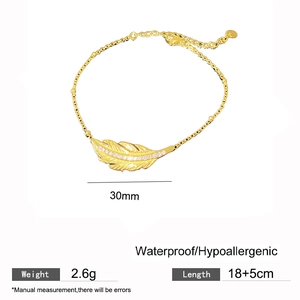 Golden feather leaf charm bracelet with white zircon and adjustable chain link