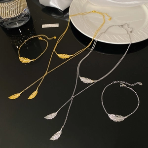 Fashion double-layer feather pendant necklace and bracelet set with sparkling crystals