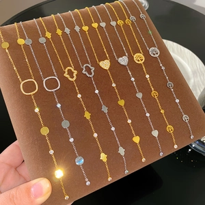 Luxe Y-shaped necklaces with Hamsa and heart pendants in gold and silver finish