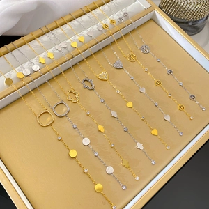 Elegant 18K gold plated stainless steel bracelets with Hamsa and Tree of Life charms