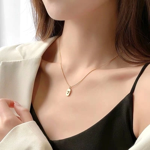 Elegant gold titanium steel snake chain necklace with Lucky 7 oval pendant for women
