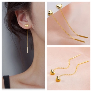 Elegant gold heart tassel drop earrings on thin long chains for a slimming face look