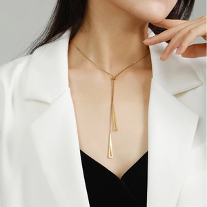 Elegant rose gold titanium geometric Y-necklace featuring dual triangle tassels on box chain