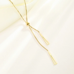Detailed view of adjustable rose gold box chain with geometric triangle tassels on satin