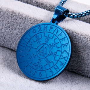 Detailed macro of blue Viking Vegvisir compass pendant with Nordic runes and brushed finish
