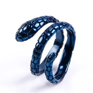 Detailed view of dark blue snake ring showing intricate scale textures and coiled design