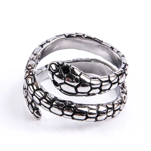 Close-up of silver snake ring with realistic scale texture and gothic wrap design