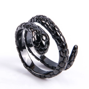 Macro detail of black stainless steel snake ring showing intricate scale texture