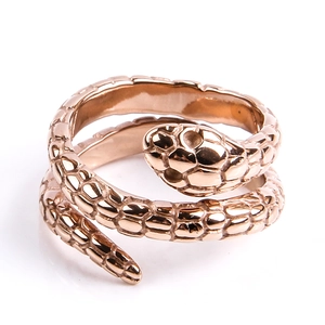Detailed view of rose gold snake ring featuring realistic scale textures and coiled design