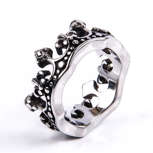 Detailed macro shot of vintage crown ring with oxidized silver finish and gothic relief