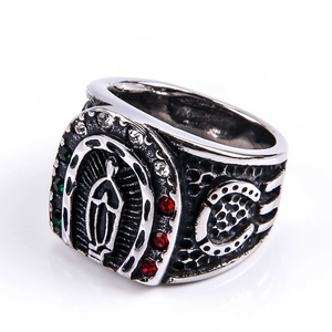 Macro view of vintage stainless steel ring with Madonna icon and colorful rhinestones