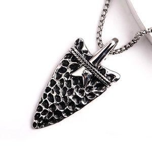 Vintage stainless steel shovel arrow pendant necklace with star texture on white background