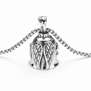 Detailed close-up of vintage steel eagle wing bell pendant with sailor engraving