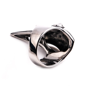 Detailed macro shot of vintage stainless steel raven skull ring with gothic engravings
