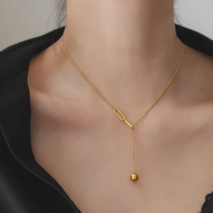 Minimalist golden bead chain necklace with asymmetric Y-shaped polished ball pendant