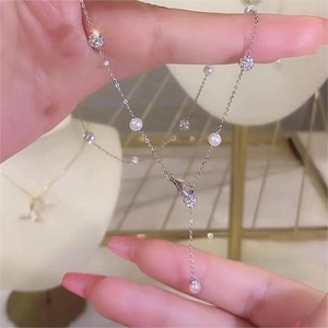 Elegant Y-shaped pearl tassel necklace with silver metal chain and sparkling crystal balls