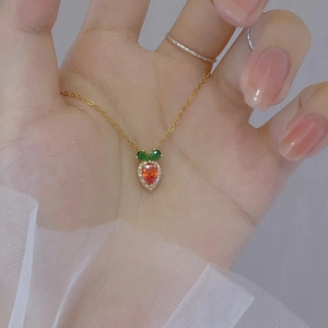 Elegant gold strawberry pendant necklace with red crystals and white zircon stones