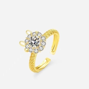 Elegant gold spinning ring with crystal flower design and cute rabbit ears for women