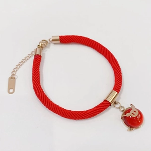 Red braided rope bracelet with gold pendant and adjustable steel clasp for luck