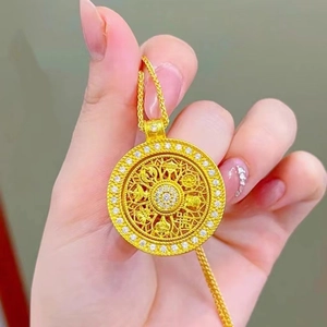 Vintage Chinese hollowed-out compass pendant necklace with gold filigree and crystals