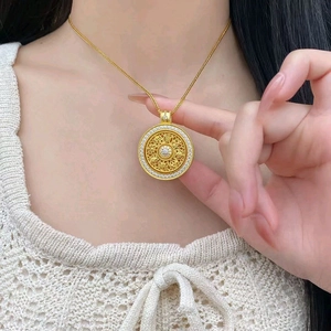 Retro Chinese style gold compass pendant necklace with white zircon inlays for women