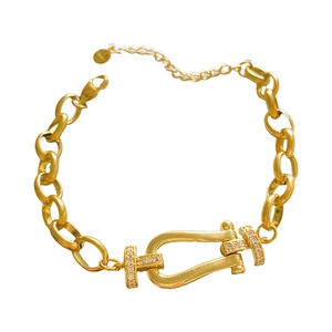 Fashionable gold horseshoe buckle chain bracelet with shimmering zircon pave setting