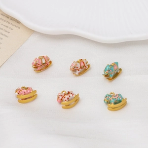 Golden rocking horse enamel pendants in pink, white and teal for DIY jewelry