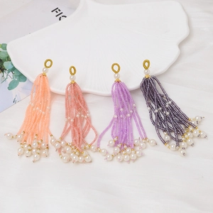 Colgantes de borlas de cuentas hechos a mano en cuatro colores para creación de joyería DIY
