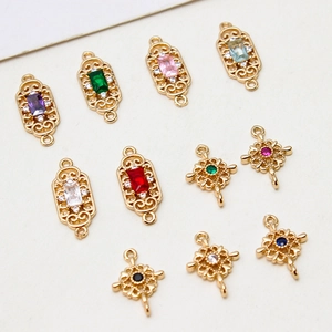 Macro detail of 18K gold plated zircon rectangular pendants for DIY jewelry making