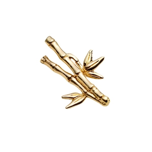 Golden bamboo stalk and leaves pendant brooch made of polished alloy on white background
