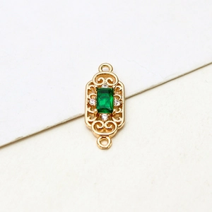 Detail of gold plated rectangular green zircon pendant connector for DIY jewelry