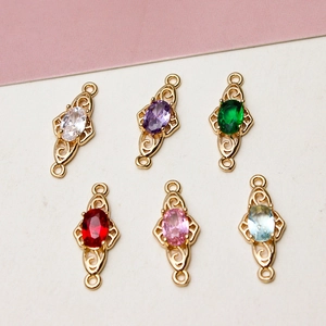 Gold plated hollow floral charms with oval cubic zirconia in six assorted colors