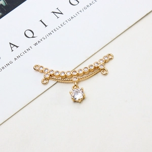 Detail of gold plated brass pendant with pave cubic zirconia for DIY jewelry making