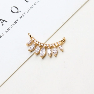 Detailed view of gold-plated curved pendant with marquise-cut zircon tassels and micro-pave