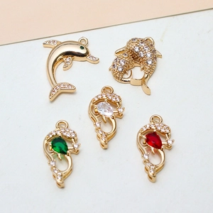 Golden dolphin charms with sparkling cubic zirconia stones for DIY jewelry making